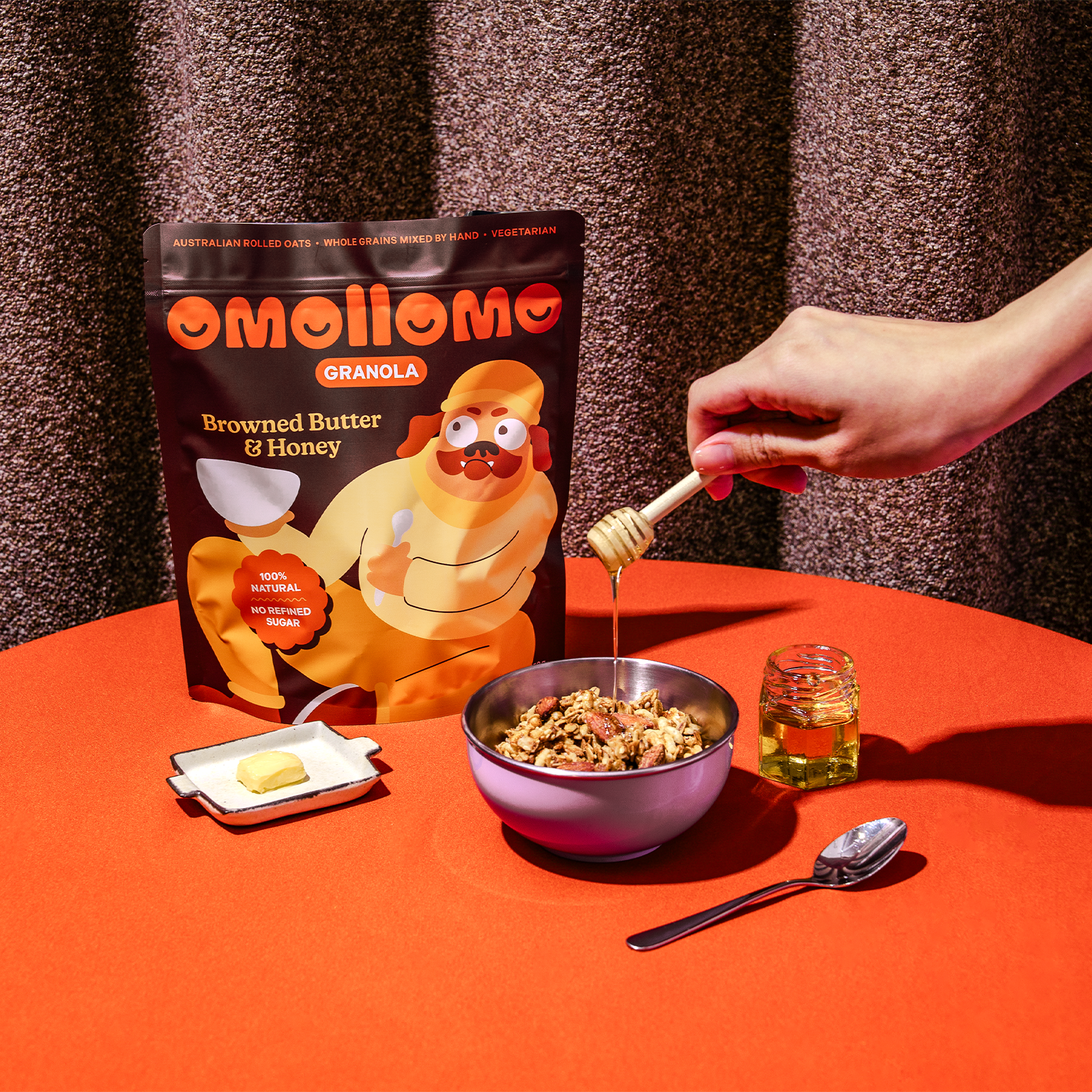 Omollomo Browned Butter and Honey Granola served in a bowl