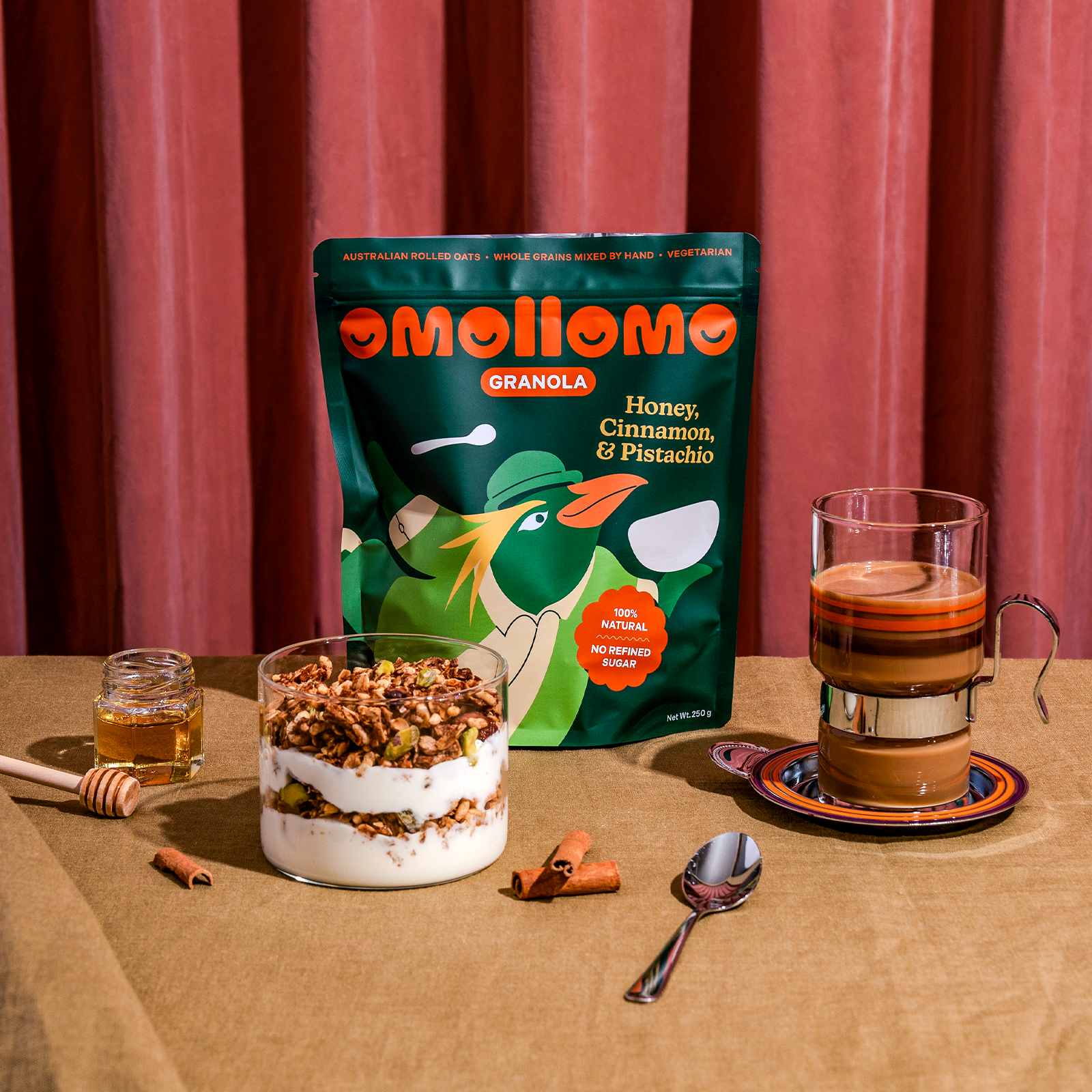 Omollomo Honey Cinnamon and Pistachio Granola served in a bowl