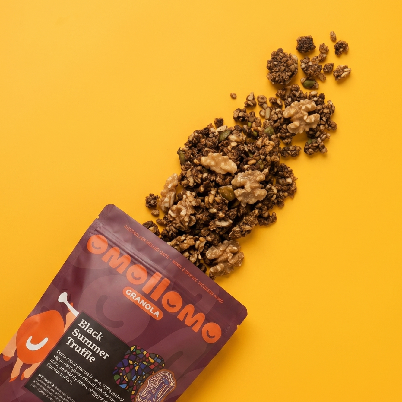 Omollomo Black Summer Truffle Savoury Granola poured out